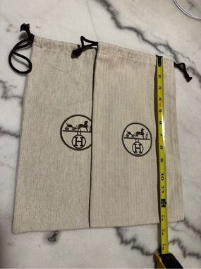 Two Hermes dustbags